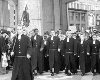 Great Britain is the birthplace of the school uniform and over the years schoolboys have worn a wide variety of official school dress. Shown is the traditional bluecoat uniform of Christ’s Hospital School in Sussex.